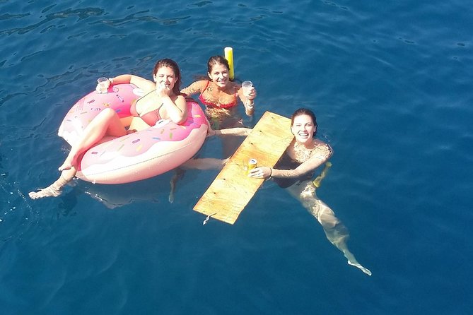 Rhodes Exclusive Swim Cruise Cocktail Open bar & Gourmet Buffet - Mandraki Harbour cruise start: the Rhodes-photo moment is built in