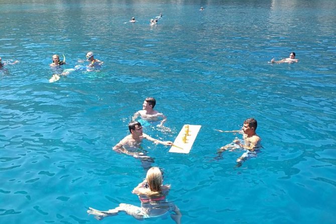 Rhodes Exclusive Swim Cruise Cocktail Open bar & Gourmet Buffet - Ladikos-to-Anthony Quinn Bay: snorkeling in deep water with lots of small fish