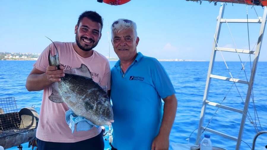 Rhodes: Fishing Trip, Snorkelling, BBQ, & Professional Guide - Entering Kolona Port: What the Start Feels Like