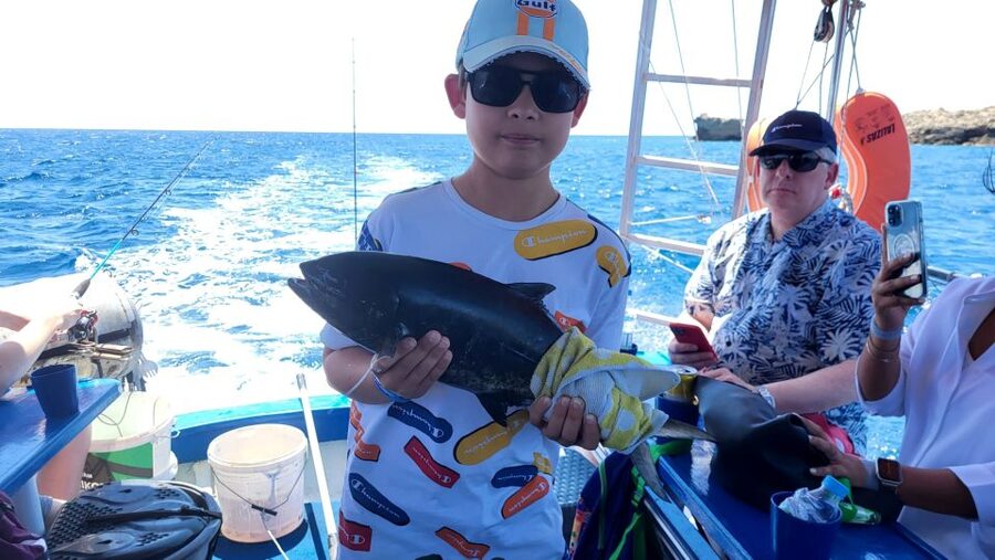 Rhodes: Fishing Trip, Snorkelling, BBQ, & Professional Guide - Anchoring in a Quiet Bay for Swimming and Snorkeling