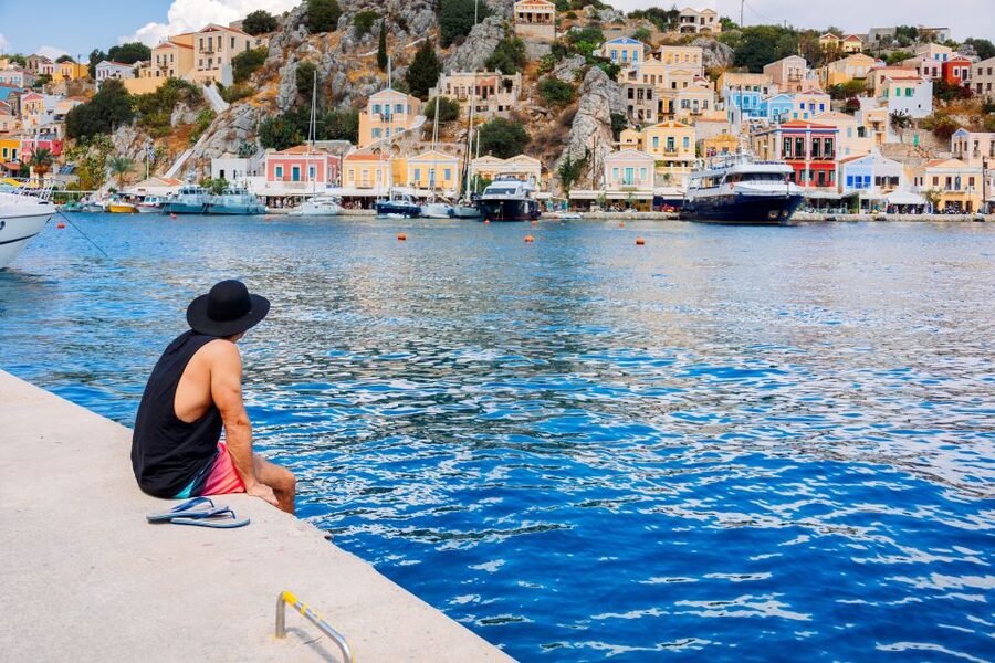 Rhodes: Speedboat trip to Symi Town and Panormitis Monastery - Getting around by minibus: comfy rides, scenic stops, and what to bring