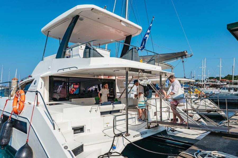 Rhodes: Sunset Catamaran Cruise with Dinner Buffet & Drinks - Rhodes sunset, timed right, from Mandraki Harbor