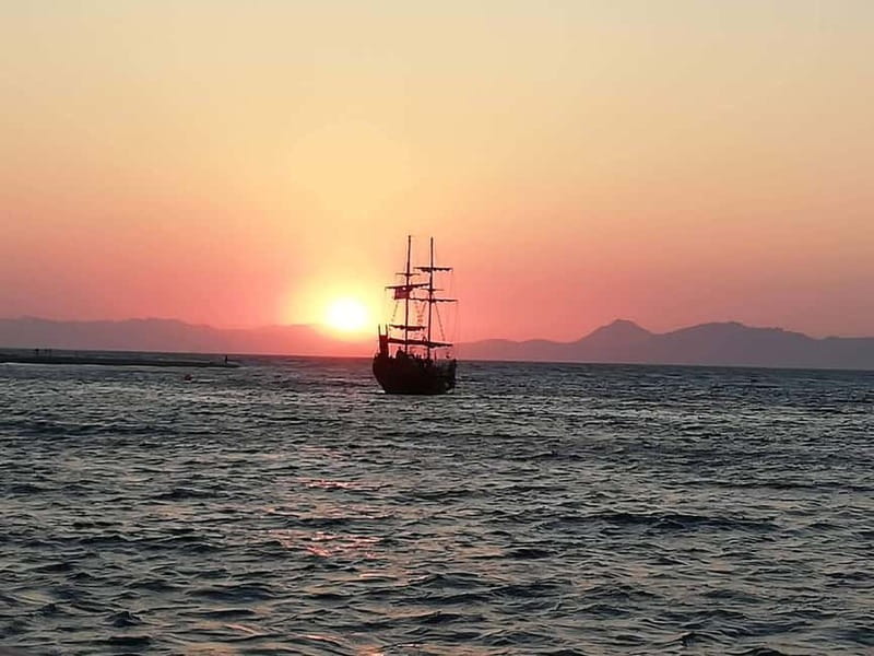 Rhodes: Sunset Cruise 1 hour on an 18th-Century Boat - Ancient Port views and the Medieval city of Rhodes from the water