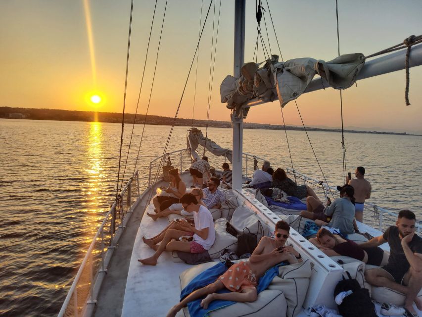 Rhodes: Sunset Cruise with Open Bar, Dinner, & Live Music - Three Horns, Then Sunset Time: How the Captain Chooses the Best View
