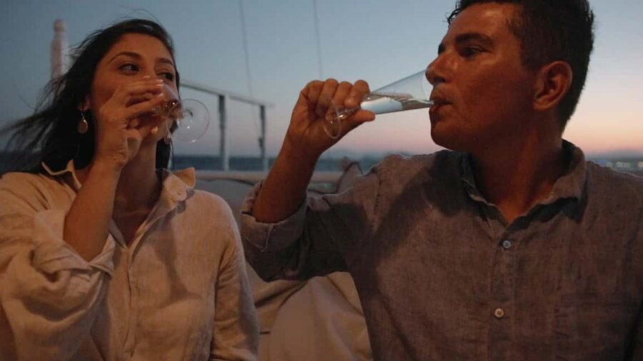 Rhodes: Sunset Cruise with Open Bar, Dinner, & Live Music - Live Music And DJ Setup: From Background to Full Singalong