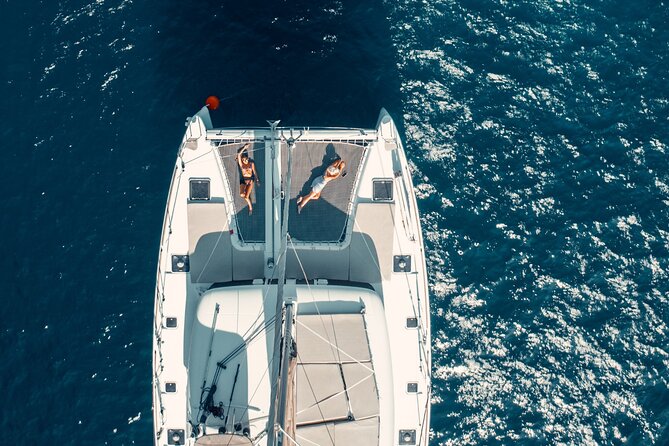 Romantic Sunset Catamaran Caldera Cruise incl. Meal & Drinks - Drinks, music, and the “romantic” mood check