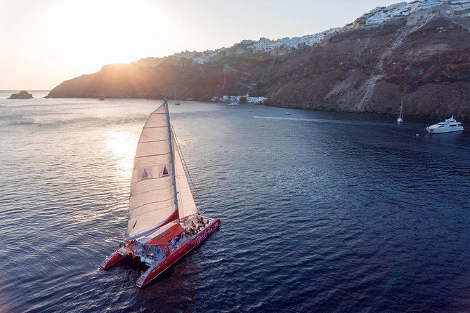 Sailing Catamaran Cruise in Santorini with BBQ, Drinks and Transfer - Getting comfortable on deck: seats, restrooms, and small practical tips