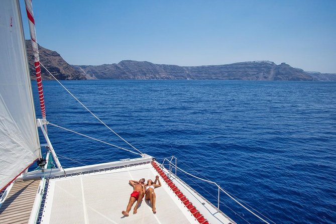 Sailing Catamaran Cruise in Santorini with BBQ, Drinks and Transfer - The crew and the best moments you’ll remember