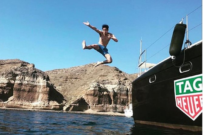 Santorini Adventurous Catamaran Experience with Snorkeling - Small-group caldera sailing: what 16 people buys you