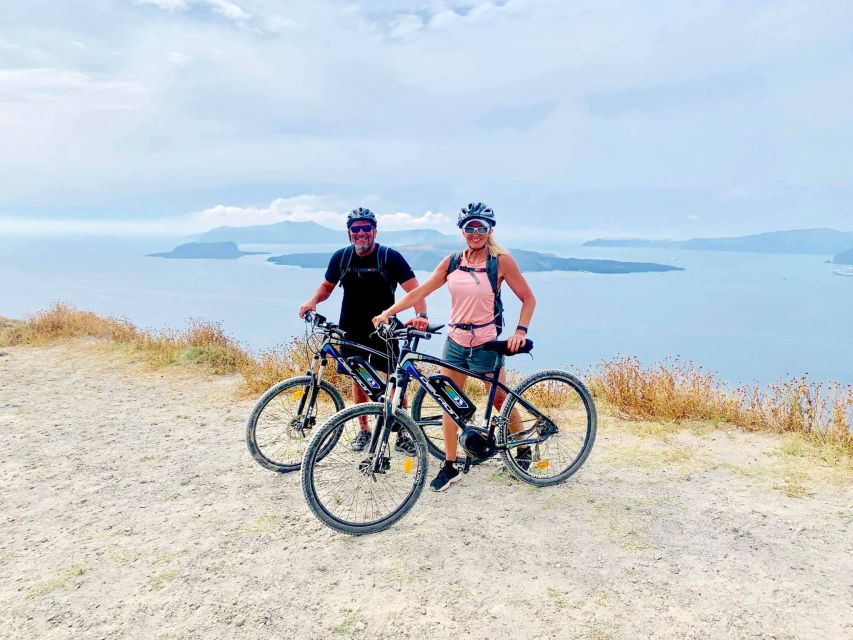 Santorini: Around the Island by Electric Bike - The return route through Emporio: windmills, vineyards, and controlled energy