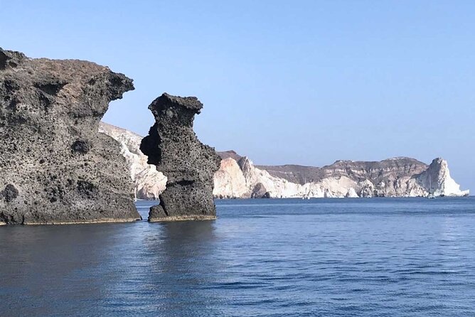 Santorini Catamaran Cruise with Greek Meal, Open-Bar and Sunset - Red Beach Swim Stop: Short Time, Big Color
