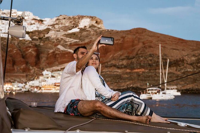 Santorini Catamaran Cruise with Greek Meal, Open-Bar and Sunset - Classic vs Luxury Sunset: Oia and Ammoudi From the Water