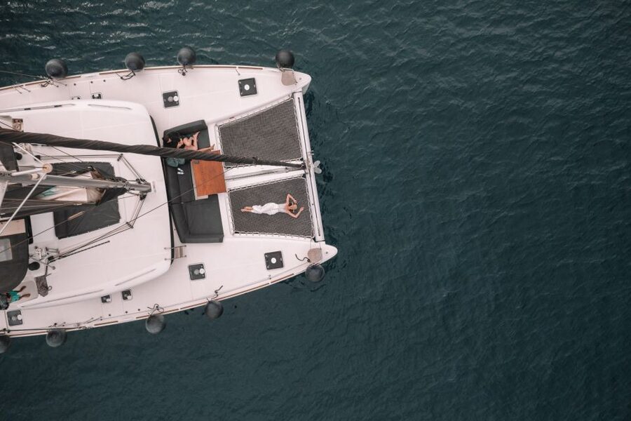 Santorini Catamaran Cruise with Swimming, Meal and Open Bar - Red Beach: the swim stop that sets the tone