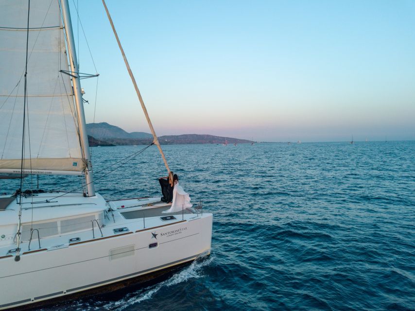 Santorini Catamaran Cruise with Swimming, Meal and Open Bar - Getting to Vlychada from Thera or Oia