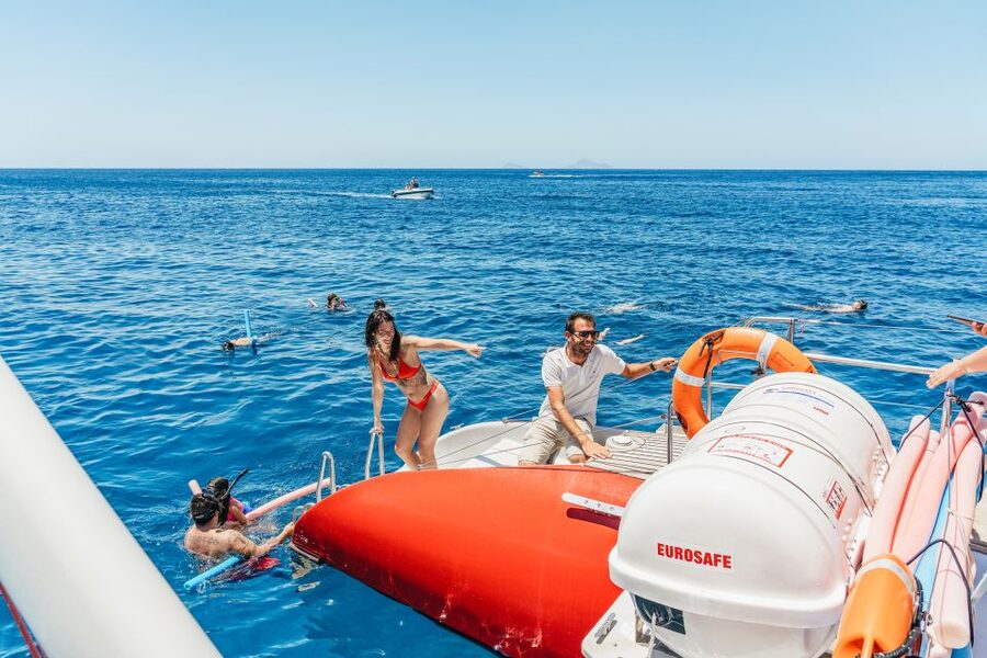 Santorini: Catamaran Tour with BBQ Dinner, Drinks, and Music - The cruise outline, hour by hour (and why each part matters)