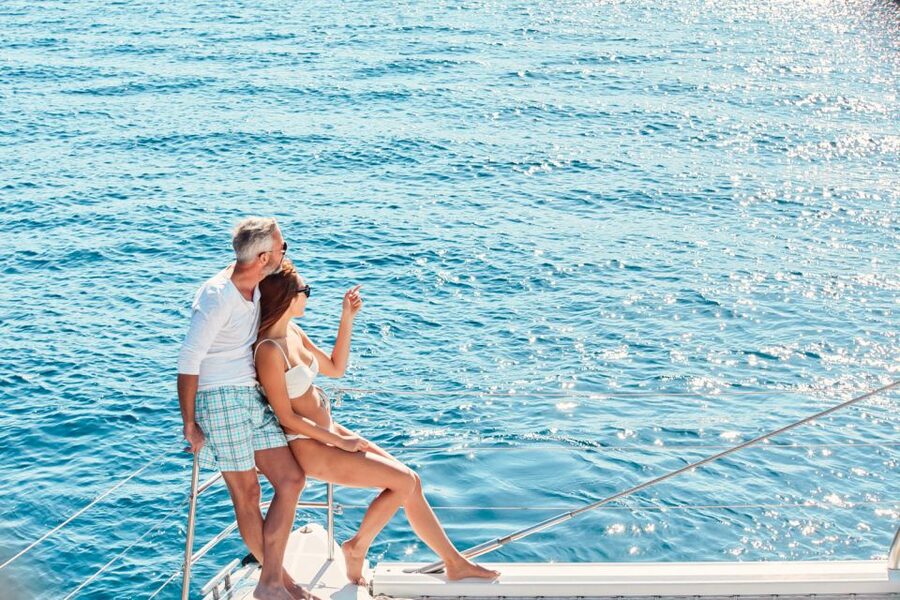 Santorini: Catamaran Tour with BBQ Meal and Unlimited Drinks - The hot springs stop: warm water, volcano views, and a calm first chapter