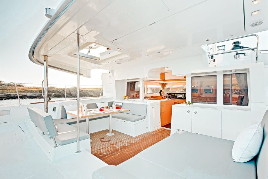 Santorini: Catamaran Tour with BBQ Meal and Unlimited Drinks - White Beach + BBQ: where the food becomes part of the sea day