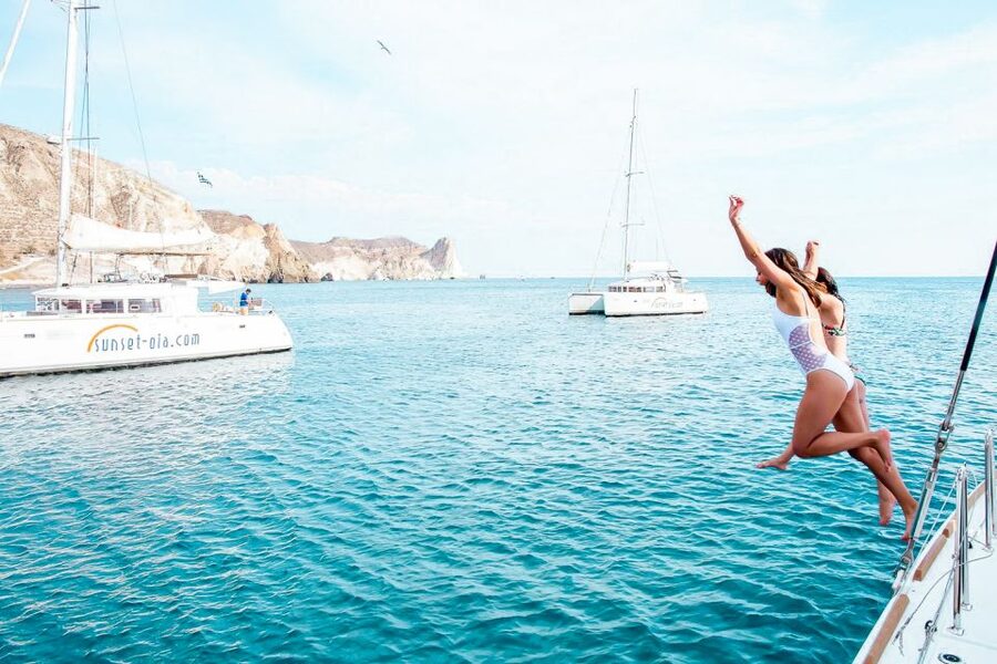 Santorini: Catamaran Tour with BBQ Meal and Unlimited Drinks - Photo moments on the way: the caldera from water level