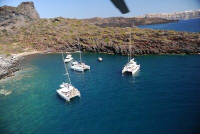 Santorini Classic Catamaran Cruise with BBQ, Drinks and Transfers
