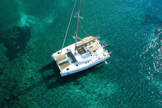 Santorini Classic Catamaran Cruise with BBQ, Drinks and Transfers - Swimming at Mesa Pigadia, Snorkeling Gear, and a No-Stress Water Break