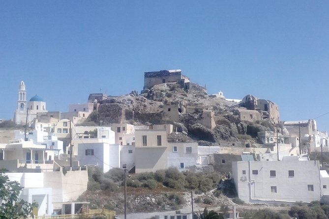 Santorini Highlights and Venetian Castles Small-Group Day Tour - Pyrgos hill town: walking up to a castle view over the caldera