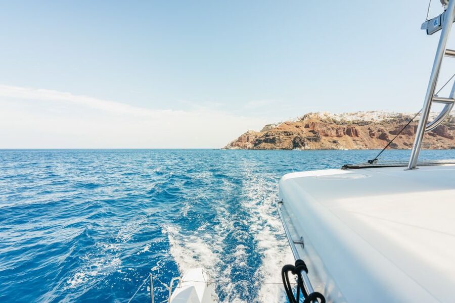 Santorini: Luxury Catamaran Day Trip with Meal and Open Bar - Value at About $129, and Who Should Skip It
