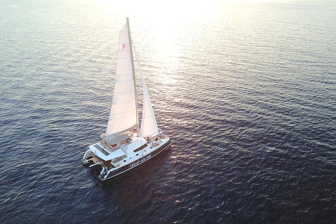 Santorini Luxury Catamaran Sunset Cruise with BBQ, Drink and Transfer - The Ipanema 58 luxury feel, plus the small-group advantage