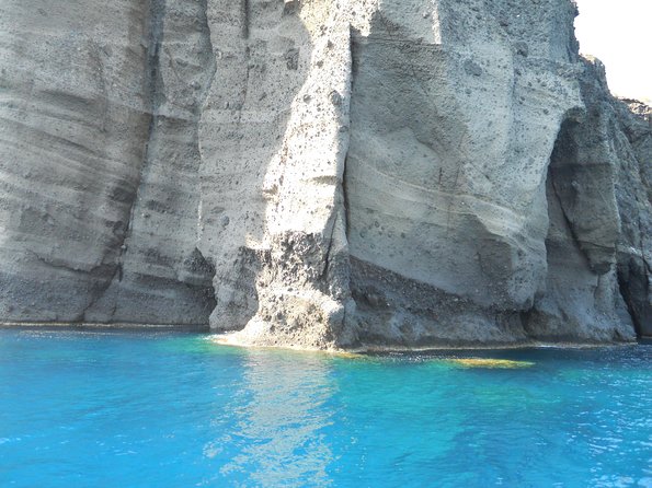 Santorini Luxury Catamaran Sunset Cruise with BBQ, Drink and Transfer - Hot Springs stop: warm sulfur water, 30 minutes, and no beach docking