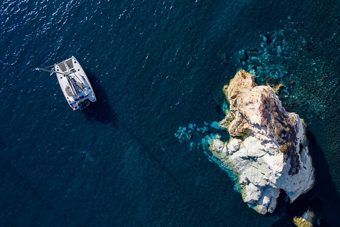 Santorini Platinum Catamaran Cruise with Meal, BBQ and Open Bar - Pickup, Meeting Point, and the Small-Group Advantage