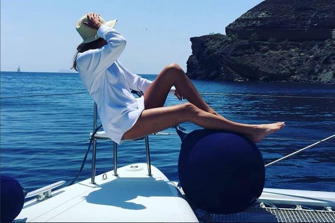 Santorini Platinum Catamaran Cruise with Meal, BBQ and Open Bar - Mesa Pigadia Swim Stop: Snorkeling in Santorini’s Clearer Water
