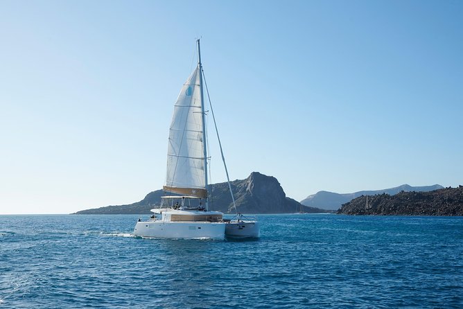 Santorini Platinum Catamaran Cruise with Meal, BBQ and Open Bar - Akrotiri Venetian Lighthouse Moment: A Photo Stop You Can Actually Use