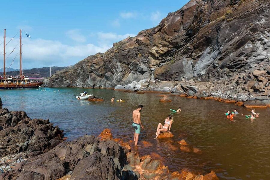 Santorini Port: Cruise to Volcano, Hot Springs & Thirassia - On Board Life: Audio Commentary, Drinks, and Caldera Views