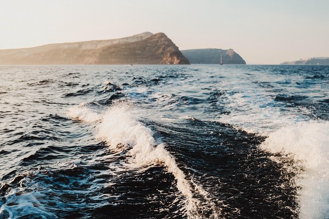 Santorini Private Catamaran Cruise with BBQ, Open Bar & Transfers - Mesa Pigadia Bay: First Swim or Relax Without Getting Dropped Off