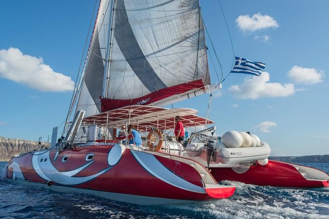 Santorini Sailing Dream Catcher with BBQ Lunch and Drinks - First stop: why Santorini feels different from the sea