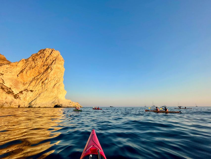 Santorini: South Sea Kayaking Tour with Sea Caves and Picnic - Paddling Past Red Beach and Watching It Change