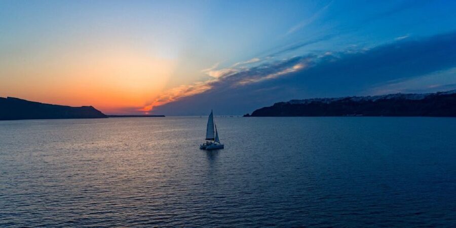 Santorini: Sunset Cruise with Swim Stops, Dinner, and Drinks - Vlychada Start, Sunset Finish, and Why the Timing Matters