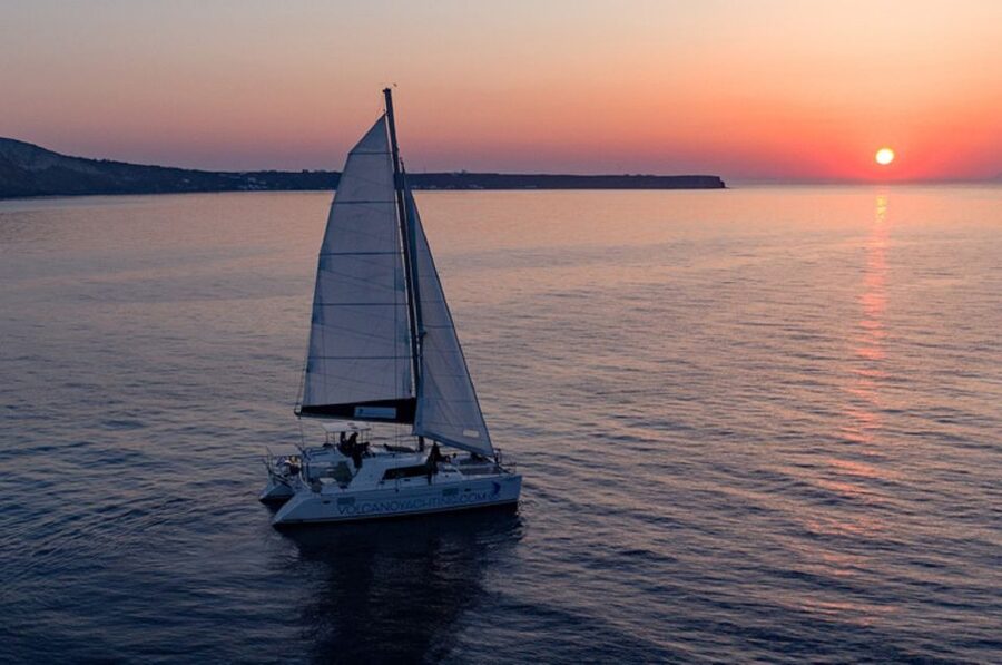 Santorini: Sunset Cruise with Swim Stops, Dinner, and Drinks - Red Beach Swim Stop: Clear Water Time and a Snorkel-Friendly Break