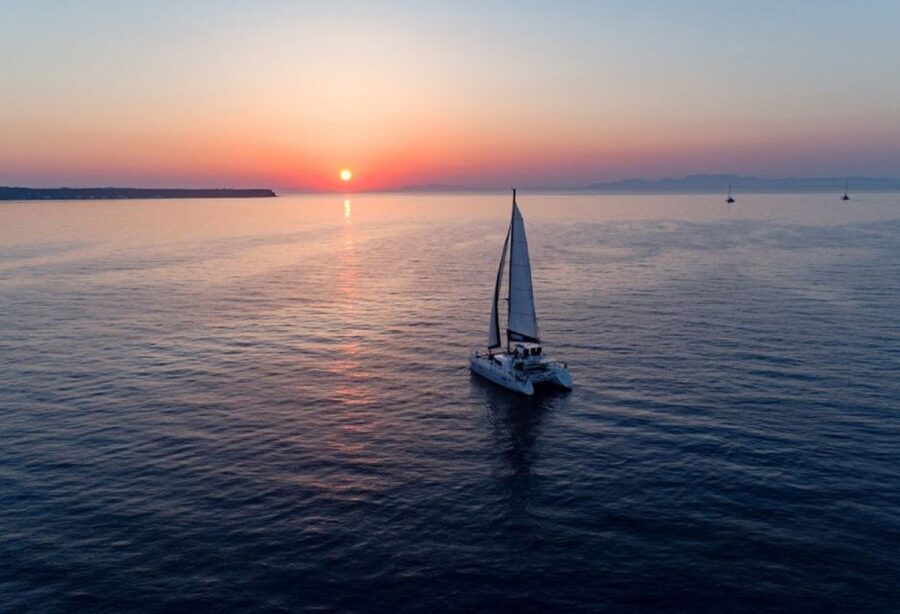 Santorini: Sunset Cruise with Swim Stops, Dinner, and Drinks - Who’s Running the Day: Crew Energy You Can Feel