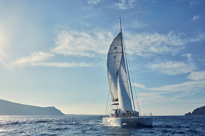 Santorini Sunset Luxury Sailing Catamaran Cruise with BBQ, drinks, transfer - Hot springs swim near the volcano: warm water, real sulfur reality