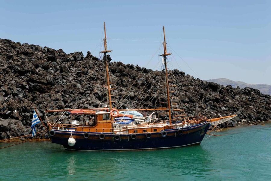 Santorini: Thirassia Islands and Volcano Guided Cruise - Palea Kameni hot springs swim: green sulphur water and short timing