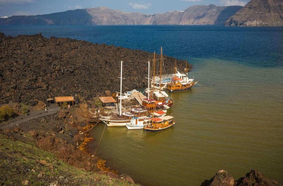 Santorini: Thirassia Islands and Volcano Guided Cruise - Athinios Port to Nea Kameni: the volcano walk and the €5 caldera entry