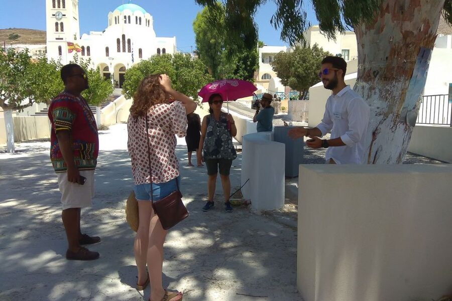 Santorini: Traditional Sightseeing Bus Tour with Oia Sunset - Emporio village and hilltop windmills, real island texture between the highlights