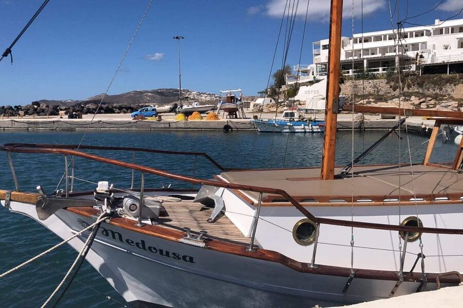 Santorini: Traditional Wooden Boat Tour with Meal and Wine - Ammoudi old harbor and the sunset option, same sights, different order