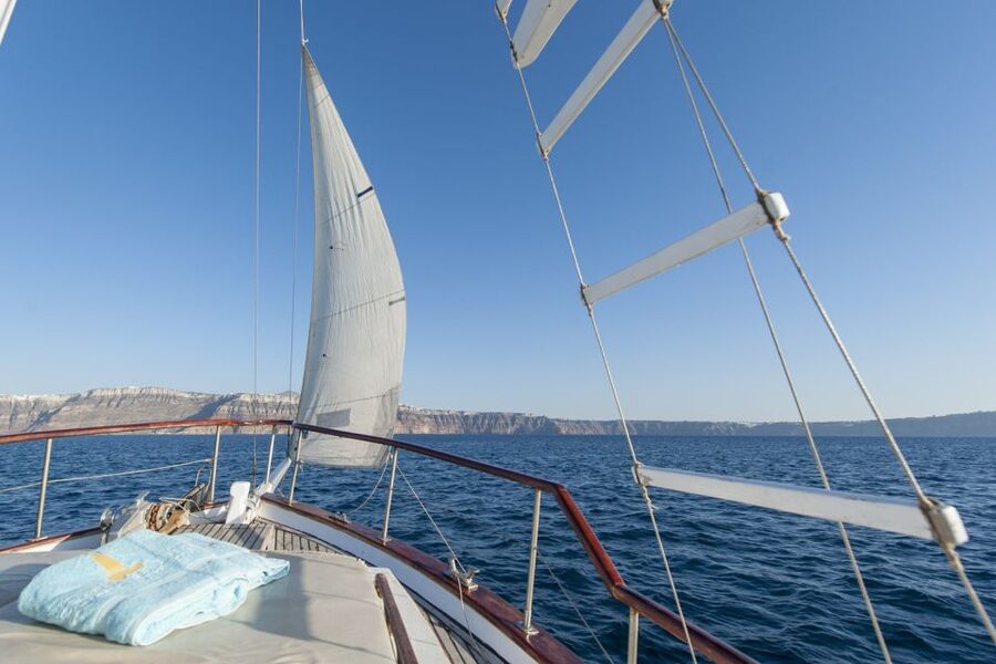 Santorini: Traditional Wooden Boat Tour with Meal and Wine - Practical tips so your day stays fun, not uncomfortable