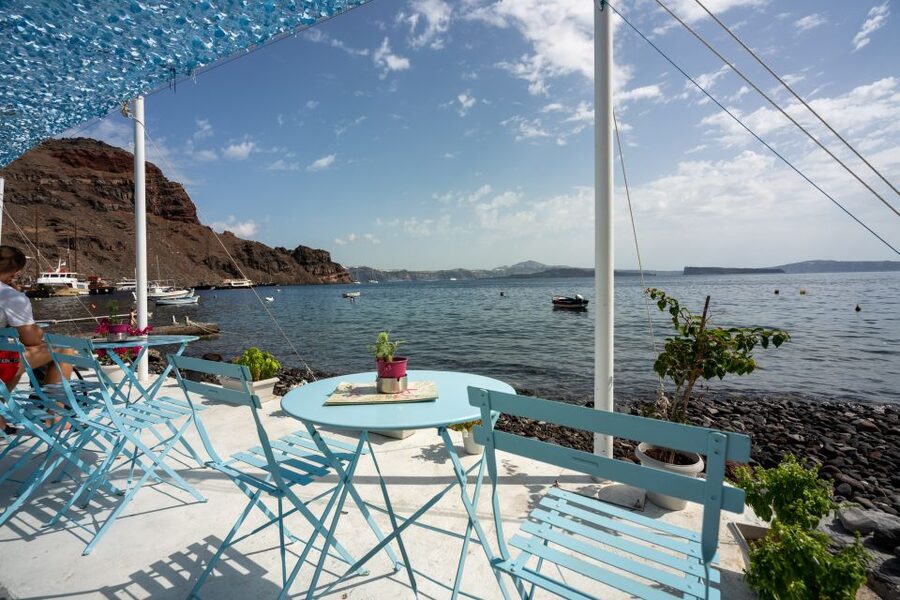 Santorini: Volcanic Islands Cruise with Hot Springs Visit - Athinios Port, a traditional wooden boat, and your morning timing