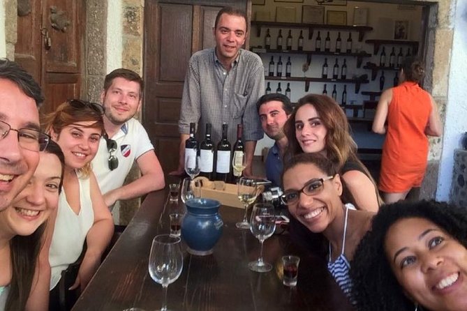 Santorini Wine Adventure with 12 Wine Tastings, Tapas and Sunset - Day tour flow: three wineries, cellar walks, and 12 pours