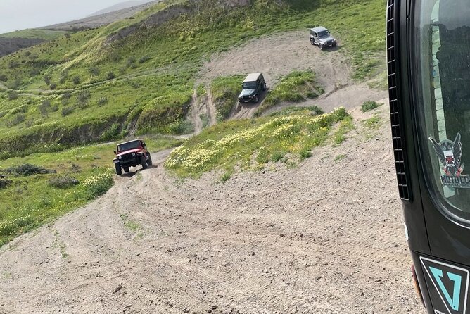 Santorini Wrangler Jeep Afternoon Convoy Tour - Vlychada’s neighbor: Eros Beach for real beach time and possible swimming