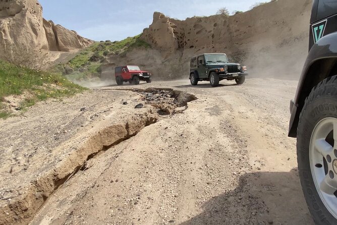 Santorini Wrangler Jeep Afternoon Convoy Tour - Megalochori Walk, Dinner, and the Sunset Finish Over the Caldera