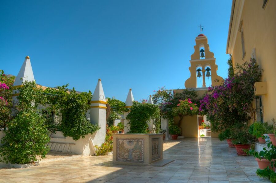 Saranda: Corfu Town and Palaiokastritsa Day Trip with Cruise - Corfu Town’s Spianada and Liston, plus Saint Spiridon’s relics