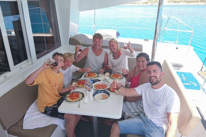 Shared Catamaran All inclusive-Day Cruise to Naxos or Paros - On-Board Lunch: Traditional Food, Local Ingredients, Cold Drinks